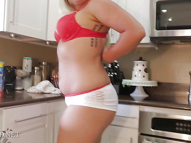 Fat ass blonde Amanda Clark gets naked in the kitchen