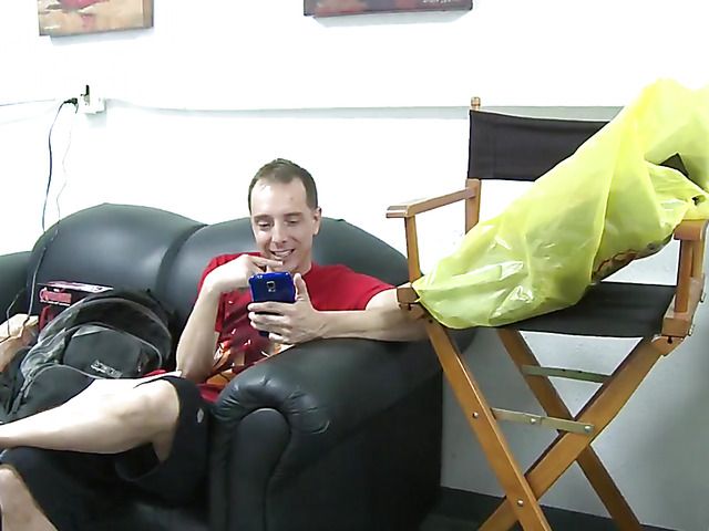 Behind the scenes with a beautiful busty redhead