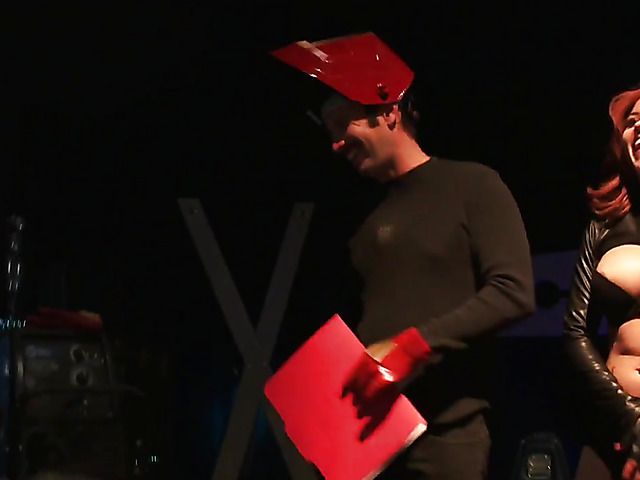 Behind the scenes with a beautiful busty redhead