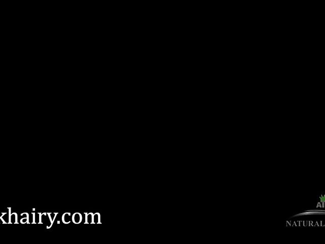 Brunette with hairy armpits spreads her bushy pussy open