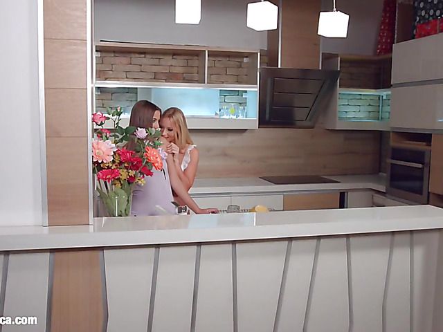 Sensual lesbian loving in the kitchen