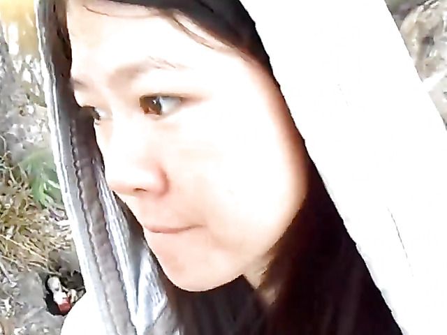 Asian girlfriend gives a public blowjob