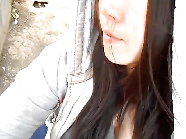 Asian girlfriend gives a public blowjob