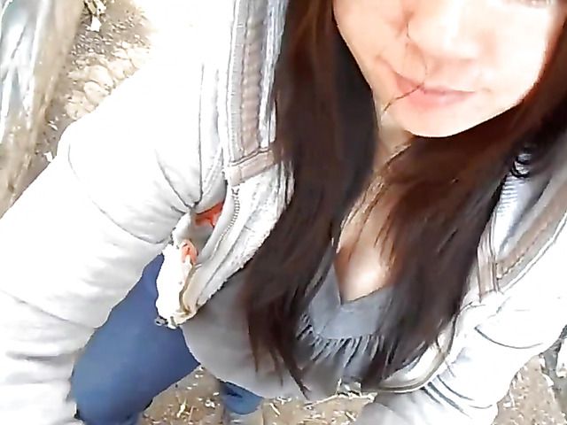 Asian girlfriend gives a public blowjob