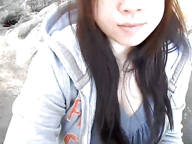 Asian girlfriend gives a public blowjob