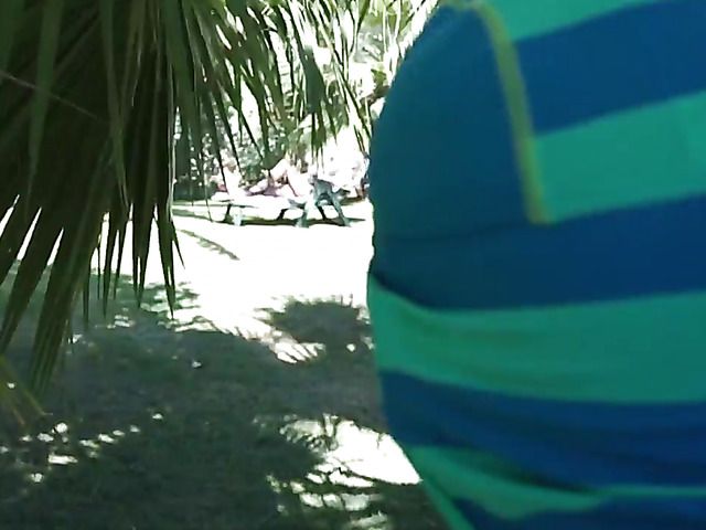 Old and young fuck under the palm tree