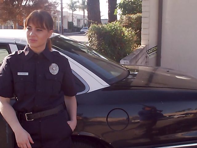 Redhead police woman Lily Cade gets strapon fucked