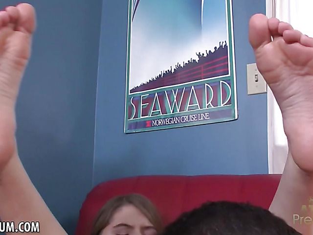 Petite teen gives a footjob and blows