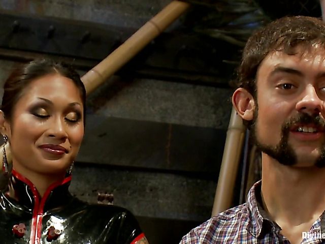 Asian dominatrix Dragon Lily strapon fucks her slave