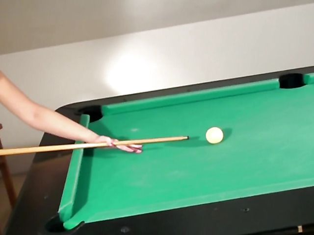 Blonde in fishnet stockings masturbates on pool table