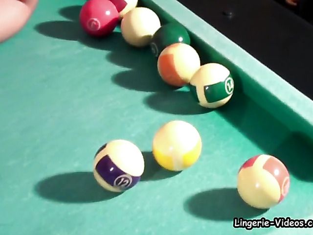 Blonde in fishnet stockings masturbates on pool table