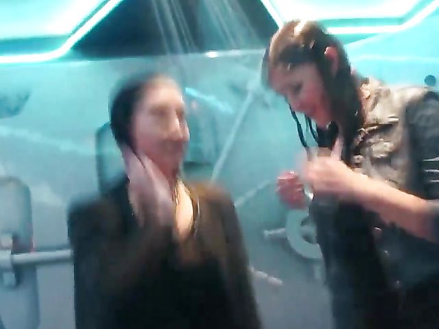 Fully clothed European girls get wet