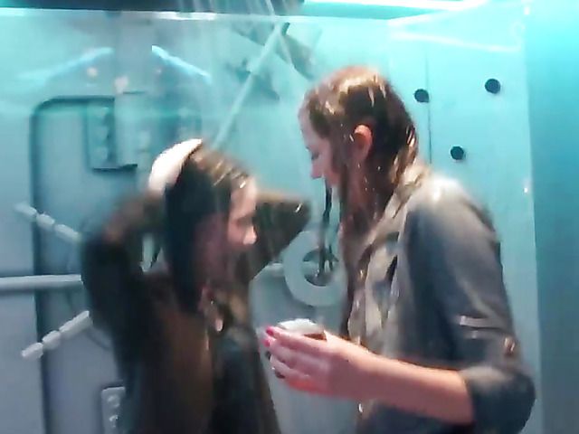 Fully clothed European girls get wet