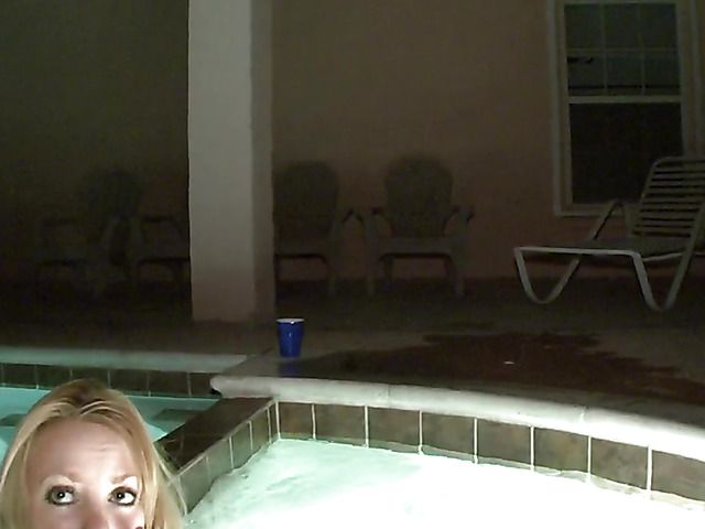 Drunk girl shows her juggs and fingers her twat in a jacuzzi