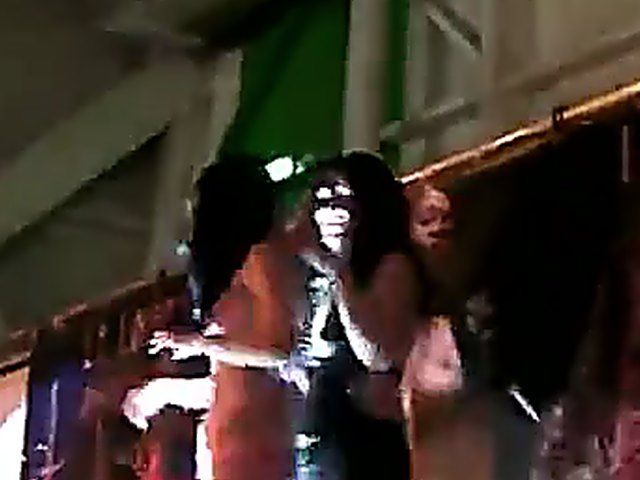 Hot naked babes dance together on stage