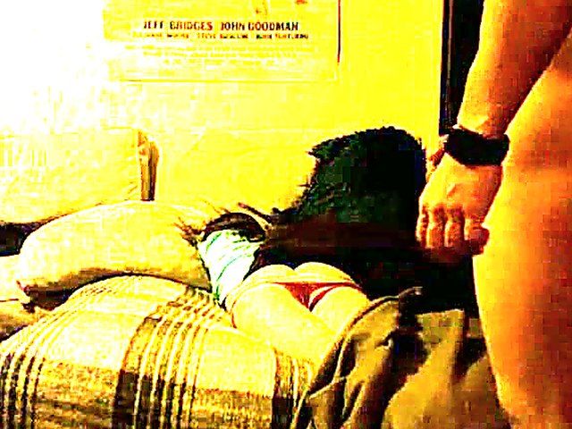 Naughty boyfriend strokes his cock as girlfriend sleeps