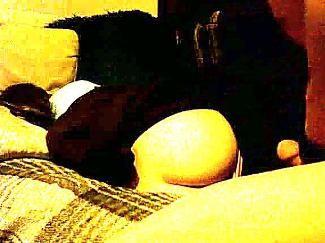 Naughty boyfriend strokes his cock as girlfriend sleeps