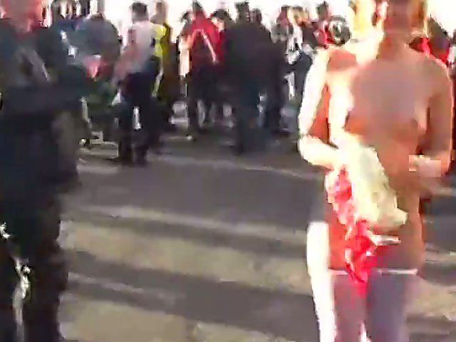 A sexy mature babe goes walking outside naked