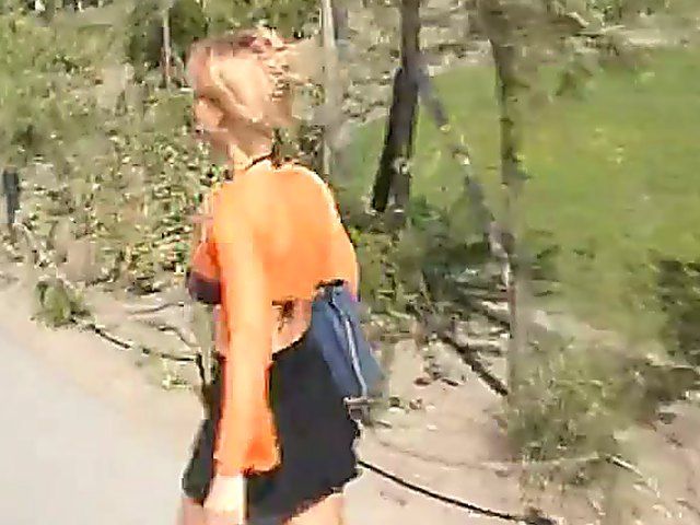 Athletic blonde flashes her pussy in public