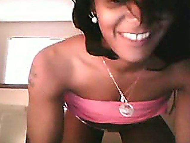 Ebony brunette stretches her ass and pussy open