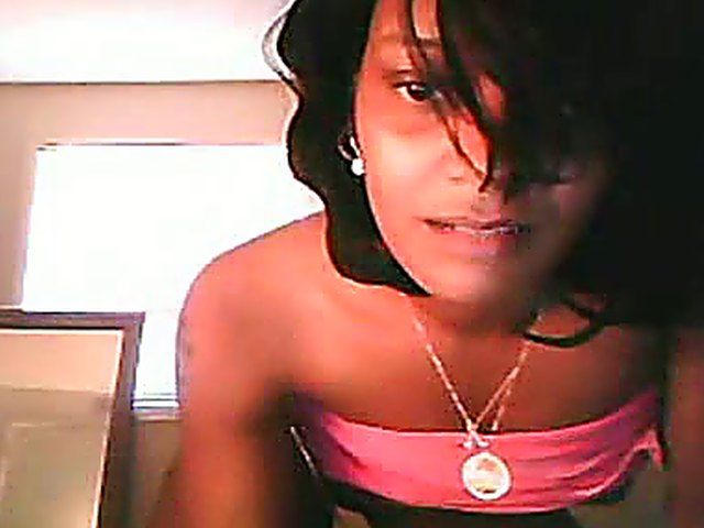 Ebony brunette stretches her ass and pussy open