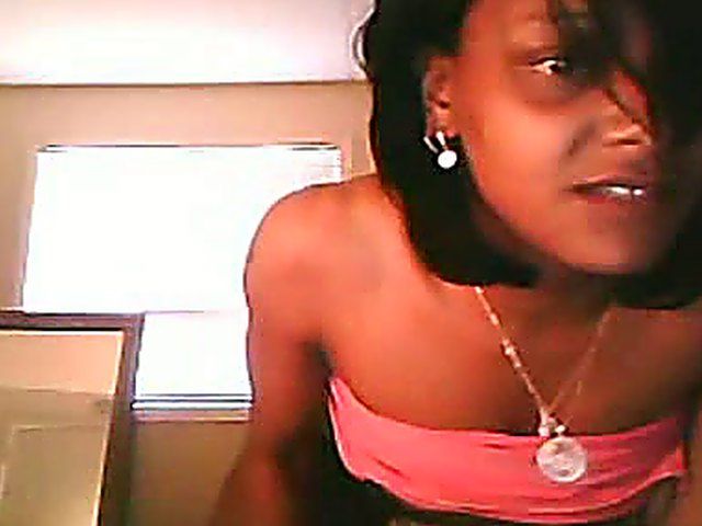 Ebony brunette stretches her ass and pussy open