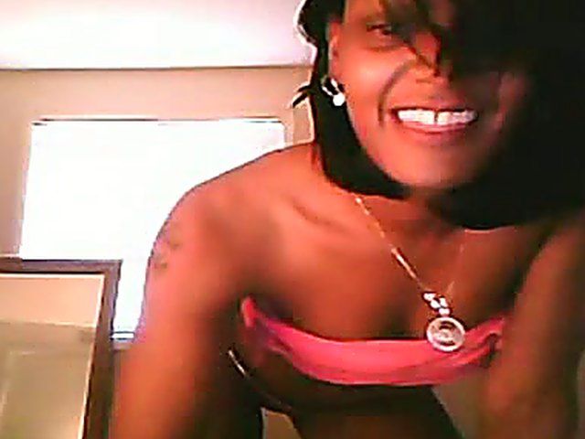 Ebony brunette stretches her ass and pussy open