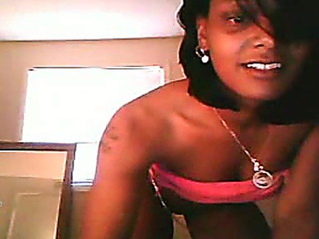 Ebony brunette stretches her ass and pussy open