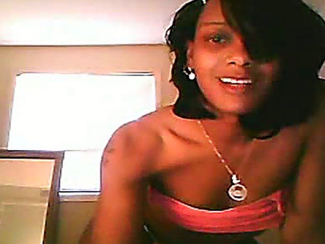 Ebony brunette stretches her ass and pussy open