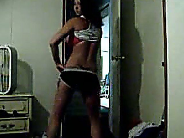 Busty brunette fingers her tight young pussy