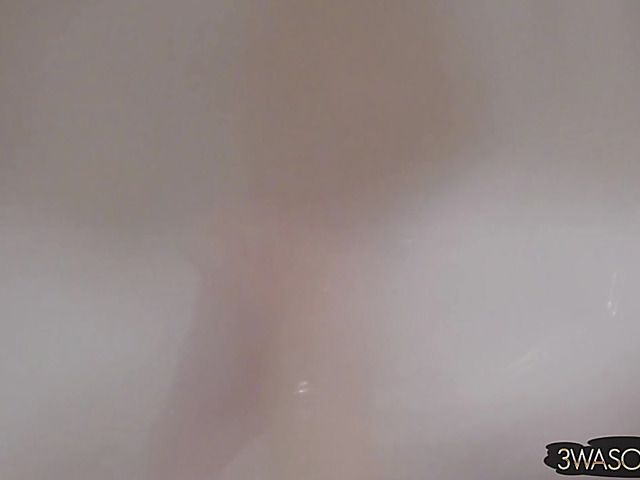 Busty Ewa Sonnet shower solo with her black dress on