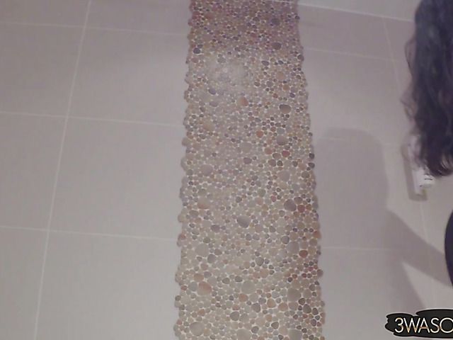 Busty Ewa Sonnet shower solo with her black dress on