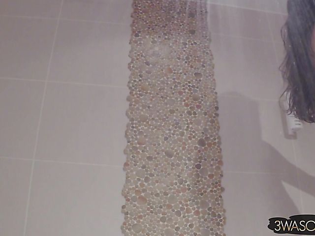 Busty Ewa Sonnet shower solo with her black dress on