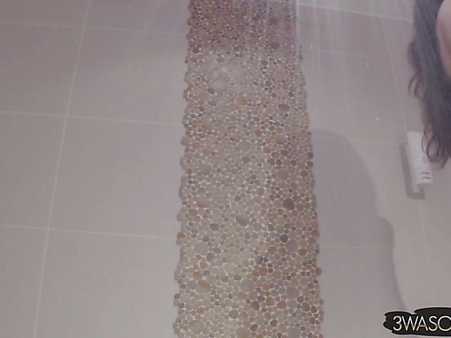 Busty Ewa Sonnet shower solo with her black dress on