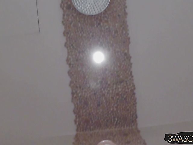 Busty Ewa Sonnet shower solo with her black dress on