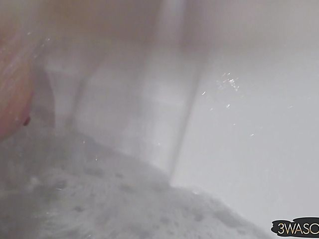 Busty Ewa Sonnet shower solo with her black dress on