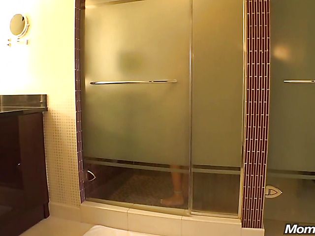 Busty mom Connie takes a shower and blows behind the scenes