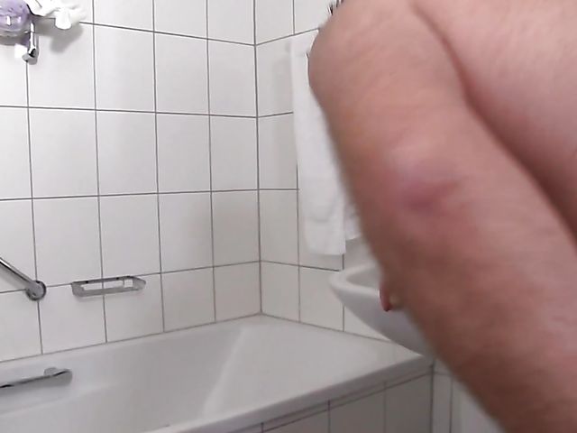 Blonde slut Sandra B fucks a nerd in the bathroom