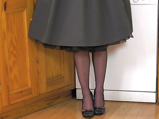 Blonde Kiana Kraze in vintage stockings shows her pink pussy