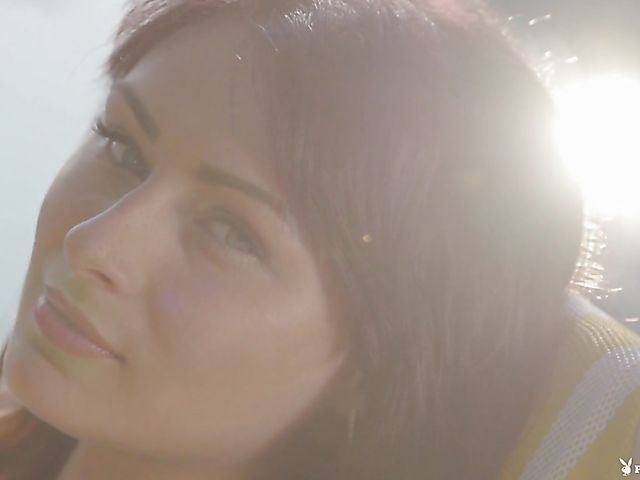 Playboy Plus model Noemi Moon shows her snatch by the pool