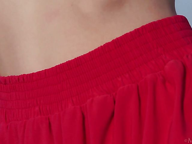 Nude teen model Nicolina posing outside