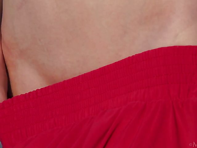 Nude teen model Nicolina posing outside