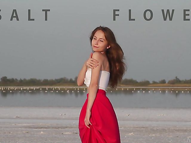 Nude teen model Nicolina posing outside