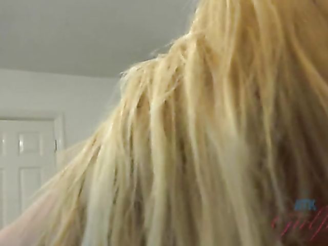 Blonde girl with a cigarette Lyra Law giving foot job