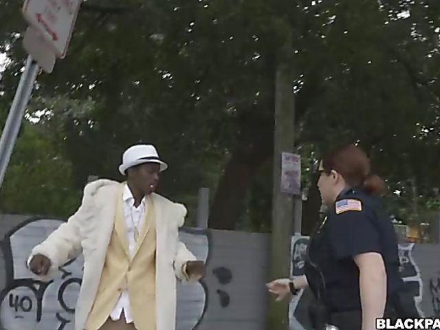 Interracial femdom with two horny police women