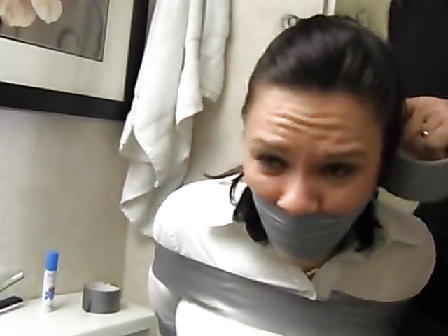 Homemade bondage in the bathroom with a girl in stockings