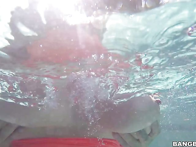 Brandy Talore with huge natural tits fucked in the pool