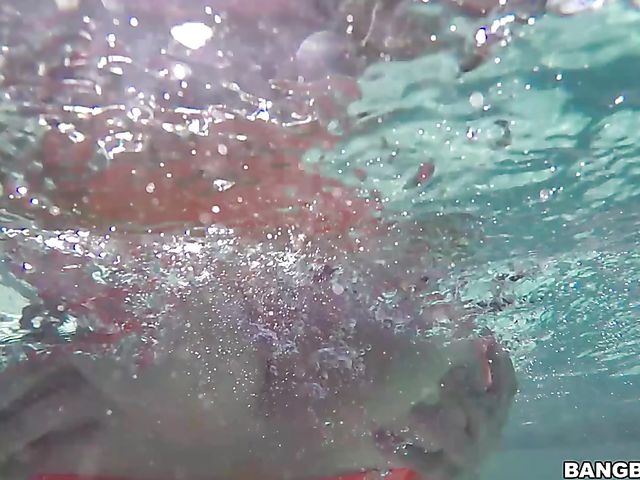 Brandy Talore with huge natural tits fucked in the pool