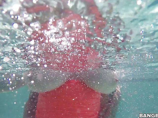 Brandy Talore with huge natural tits fucked in the pool