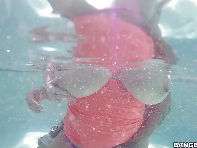 Brandy Talore with huge natural tits fucked in the pool